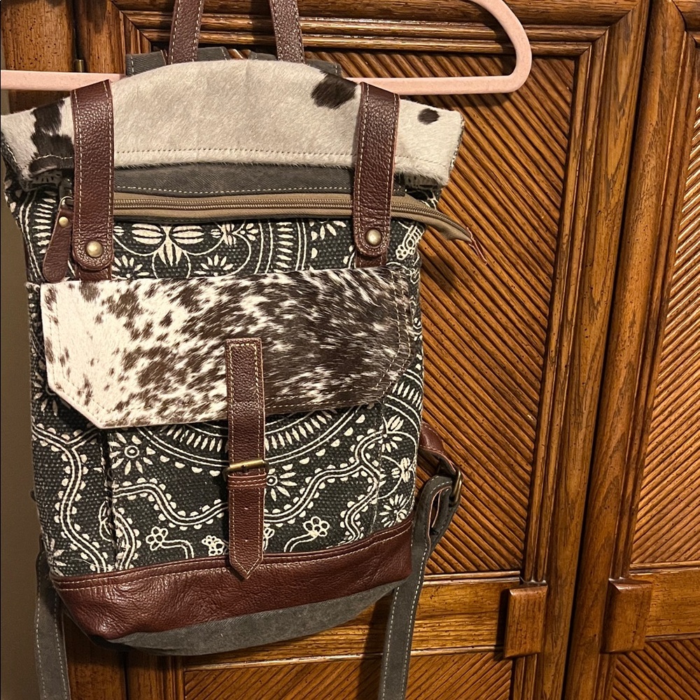 Myra Bag Brownand Black Patterned Backpack with cow design print